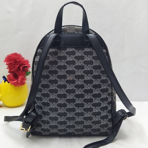 Michael Kors Brown Canvas Leather Trim MK Printed Top Zipper Closure Backpack - Picture 2 of 16